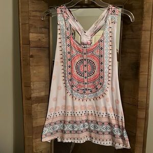 Like new racer back tank in medium with multi color Aztec pattern